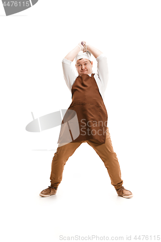 Image of Angry aggressive butcher posing with a cleaver isolated on white background