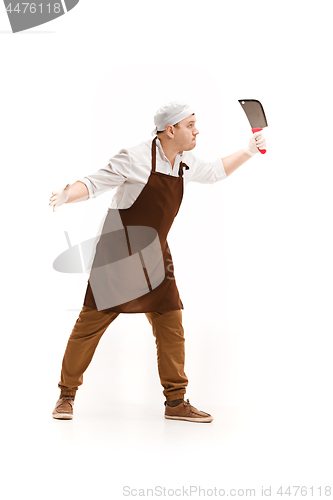 Image of Angry aggressive butcher posing with a cleaver isolated on white background