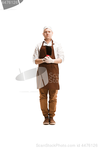 Image of Smiling butcher posing with a cleaver isolated on white background