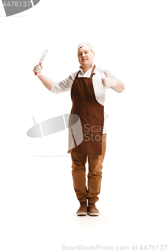 Image of Smiling butcher posing with a cleaver isolated on white background