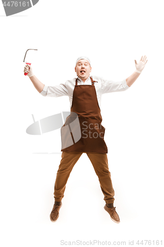 Image of Smiling butcher posing with a cleaver isolated on white background