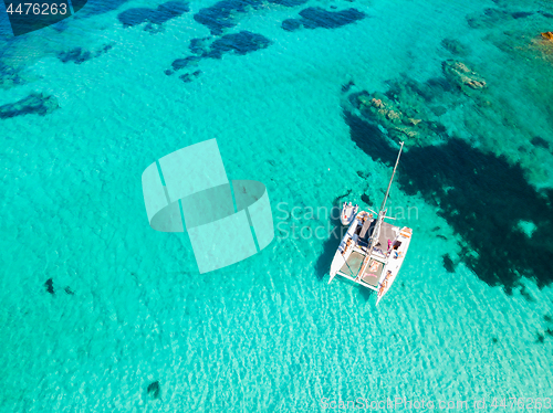 Image of Drone aerial view of catamaran sailing boat in Maddalena Archipelago, Sardinia, Italy.