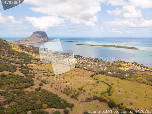 Image of Aerial view of La Gaulette, popular kitesurfing tourist town with Le Morne Brabant mountain, the World Heritage UNESCO site seen in the back.