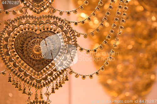 Image of gold jewelry in the shop window