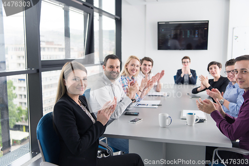 Image of Group of young people meeting in startup office