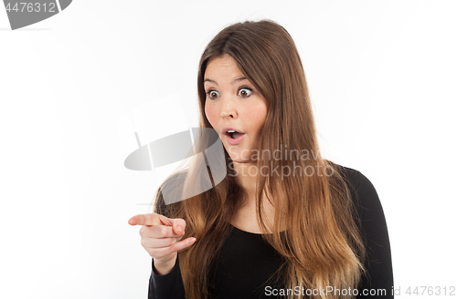 Image of Beautiful young woman showing blank signboard