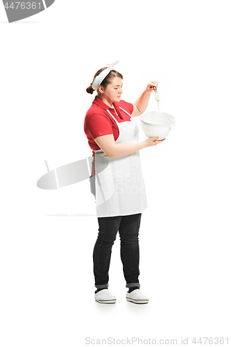 Image of Portrait of cute smiling woman with bowl in her hands in the studio, isolated on white background