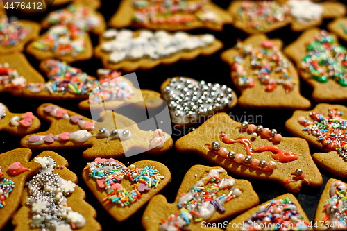 Image of Homemade christmas cookies on a dark table