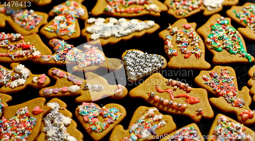 Image of Homemade christmas cookies on a dark table