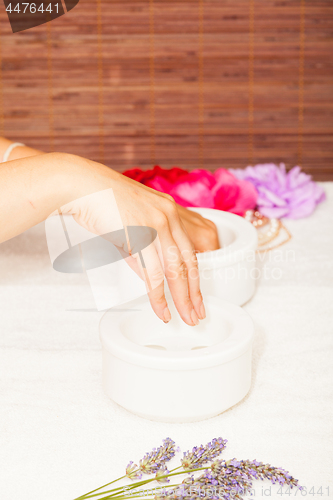 Image of Preparing a woman\'s hands for a manicure