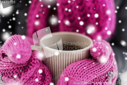 Image of close up of woman with tea mug outdoors in winter