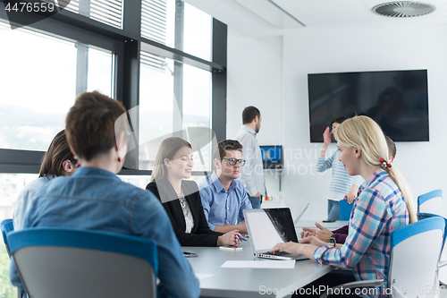 Image of Business Team At A Meeting at modern office building