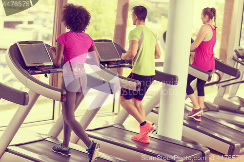 Image of people exercisinng a cardio on treadmill