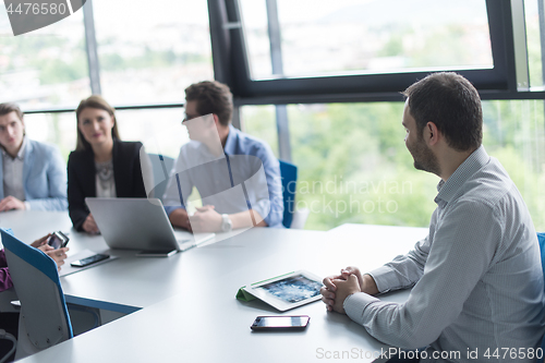 Image of Business Team At A Meeting at modern office building
