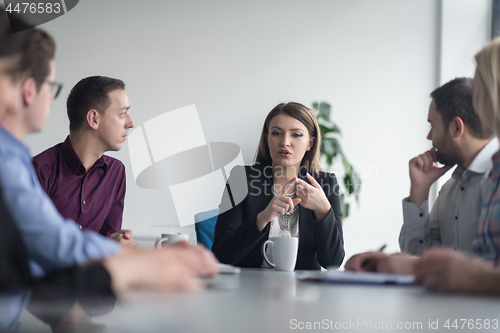 Image of Group of young people meeting in startup office