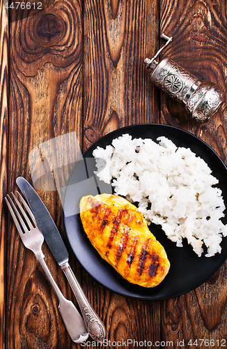 Image of boiled rice with fried chicken breast