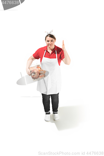 Image of Portrait of cute smiling woman with pastries in her hands in the studio, isolated on white background