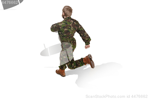 Image of Young army soldier wearing camouflage uniform isolated on white