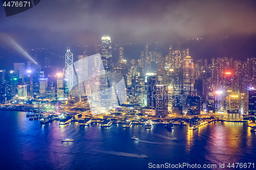 Image of Aerial view of illuminated Hong Kong skyline. Hong Kong, China