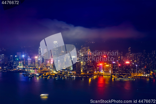 Image of Aerial view of illuminated Hong Kong skyline. Hong Kong, China