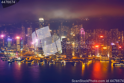 Image of Aerial view of illuminated Hong Kong skyline. Hong Kong, China