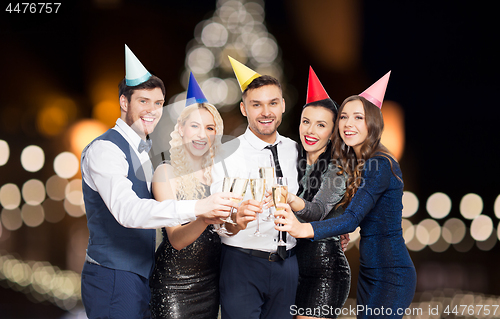 Image of friends with champagne glasses at christmas party