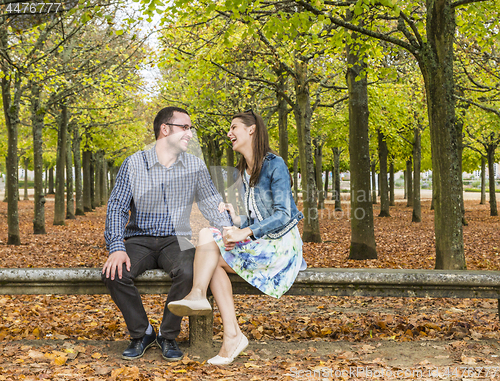 Image of Happy Couple in a Park in Autumn