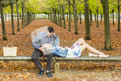 Image of Romantic Couple in a Park in Autumn