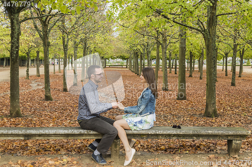 Image of Happy Couple in a Park in Autumn