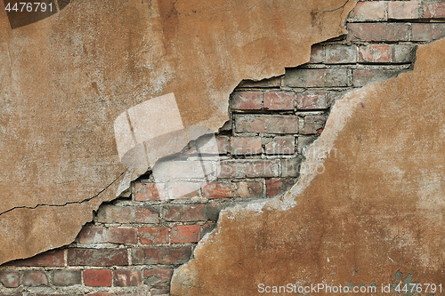 Image of Cracked concrete vintage brick wall