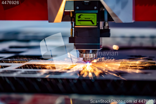 Image of CNC Laser cutting of metal, modern industrial technology.