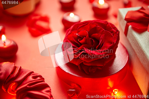 Image of Valentines day romantic decoration with roses, boxed gifts, candles