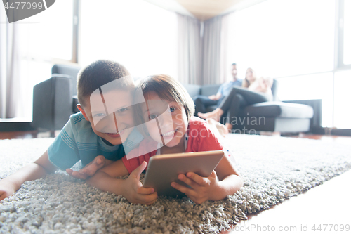 Image of couple spending time with kids