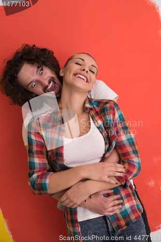 Image of couple in love  over color background
