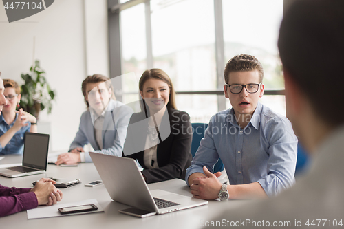 Image of Business Team At A Meeting at modern office building
