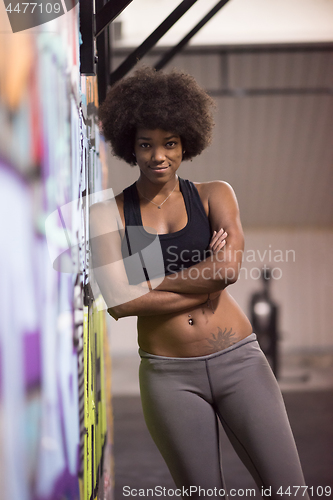 Image of black woman after a workout at the gym