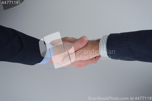 Image of cloasing the deal in modern office interior top view