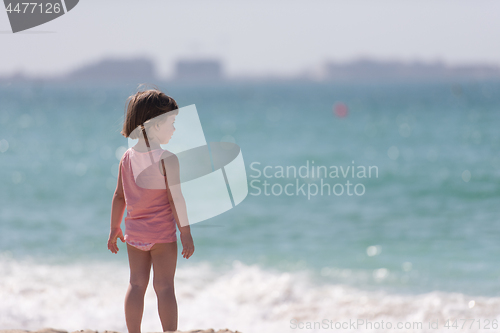 Image of little cute girl at beach