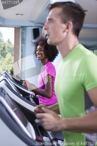 Image of people exercisinng a cardio on treadmill