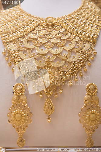 Image of gold jewelry in the shop window