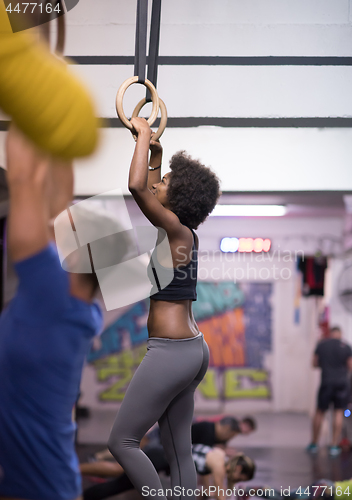 Image of black woman doing dipping exercise