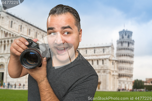 Image of Hispanic Male Photographer With Camera at Leaning Tower of Pisa