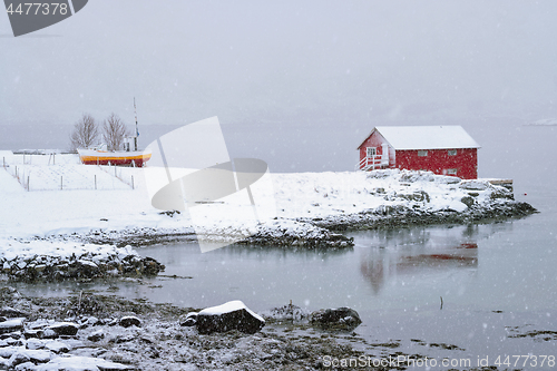 Image of Red rorbu house in winter, Lofoten islands, Norway