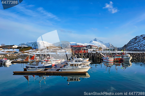 Image of Fishing boats and yachts on pier in Norway