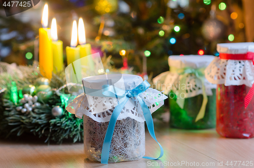 Image of Gifts on the background of decorated spruce.