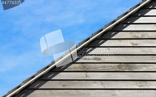 Image of Old Wood Planks Texture Under The Roof And Natural Sky Backgroun
