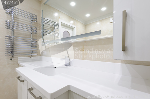 Image of modern bathroom with mirror