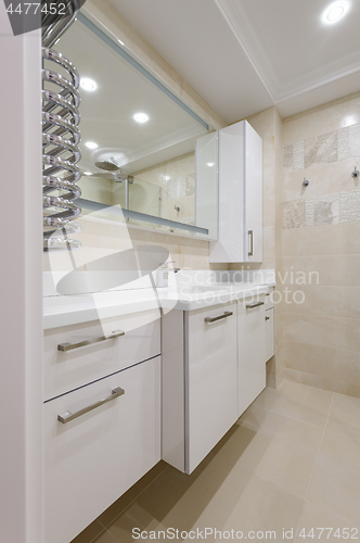 Image of modern bathroom with mirror