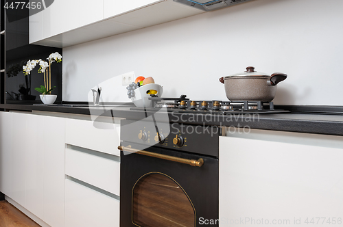 Image of Modern classic black and white kitchen