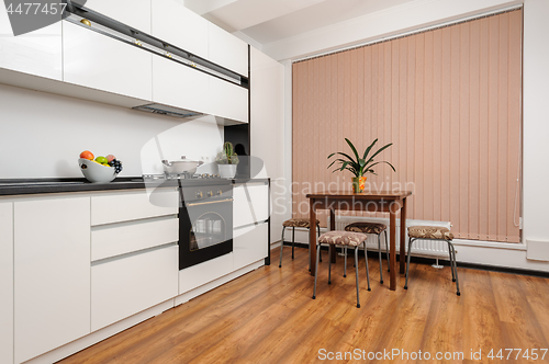 Image of Classic black and white kitchen